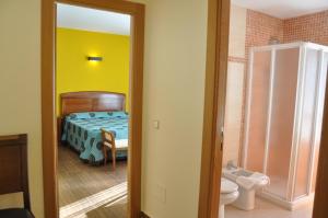 Postel nebo postele na pokoji v ubytování Hotel de Alba