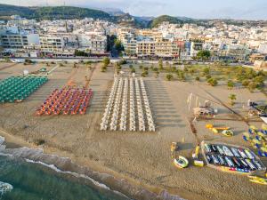 an aerial view of a beach with a water park at Kriti Beach Hotel in Rethymno