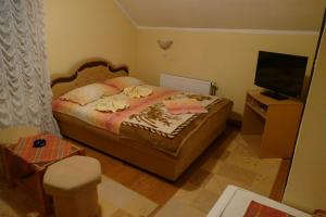 Letto o letti in una camera di UTR Jagnjilo 1986