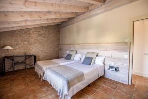 Tempat tidur dalam kamar di La Codina