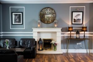 Ein Sitzbereich in der Unterkunft The Gateway Hotel