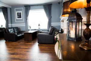 Ein Sitzbereich in der Unterkunft The Gateway Hotel
