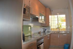 Kuchyňa alebo kuchynka v ubytovaní Apartamento Puertosol