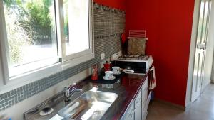 Kjøkken eller kjøkkenkrok på Cabaña Loft La Ribera
