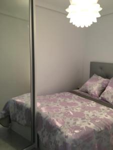 Ένα ή περισσότερα κρεβάτια σε δωμάτιο στο Apartamento Exclusivo en la Playa 9