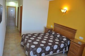 Postel nebo postele na pokoji v ubytování Hotel de Alba