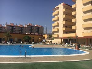 Bazén v ubytování Sea View Apartment Los Cristianos nebo v jeho okolí