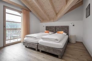Katil atau katil-katil dalam bilik di Ciasa de Lenz