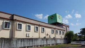 a building with a sign on the top of it at Hotel Elegance (Love Hotel) in Karatsu