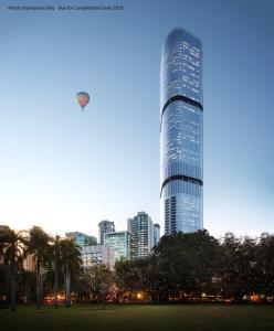 a large building with a kite flying in the sky at Brisbane Skytower in Brisbane