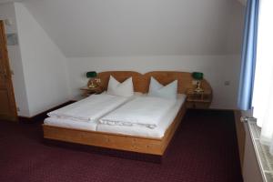 Postel nebo postele na pokoji v ubytování Hotel-Restaurant Johanneshof
