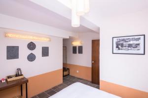 Letto o letti in una camera di The Museum