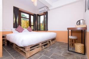Letto o letti in una camera di The Museum