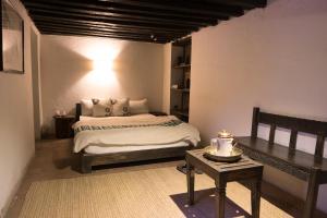 Letto o letti in una camera di Peacock Guest House