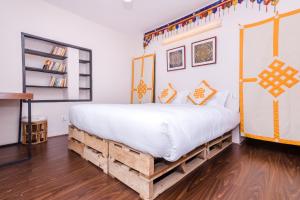 Letto o letti in una camera di The Museum