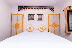 Letto o letti in una camera di The Museum