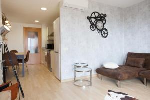 A seating area at Apartment Beach Front Canet