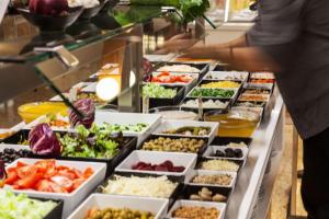 a buffet filled with lots of different types of food at Hotel Xaine Park in Lloret de Mar