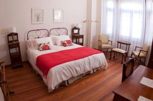 Postel nebo postele na pokoji v ubytování Hotel Papiros