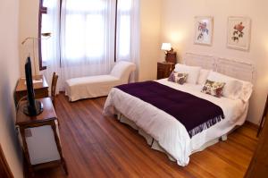 Postel nebo postele na pokoji v ubytování Hotel Papiros