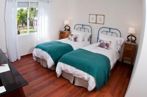 Postel nebo postele na pokoji v ubytování Hotel Papiros