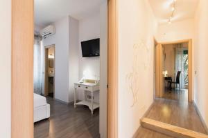 TV i/ili multimedijalni sistem u objektu B&B Blueberry Rooms