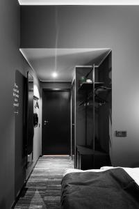Ένα ή περισσότερα κρεβάτια σε δωμάτιο στο Quality Hotel The Box