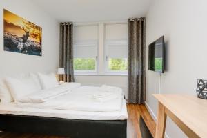 Llit o llits en una habitació de Almnäs Park Hotel