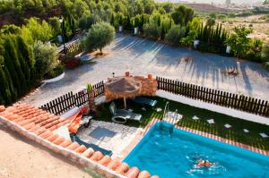 Výhled na bazén z ubytování Cuevas de Rolando nebo okolí