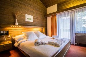Cama o camas de una habitación en Hotel La Collina