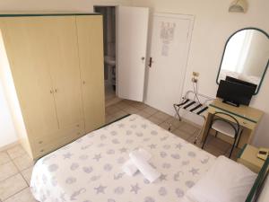 Voodi või voodid majutusasutuse Hotel Gemini toas