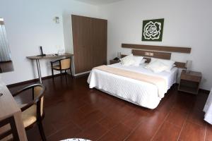 Postel nebo postele na pokoji v ubytování Hotel Schroeder