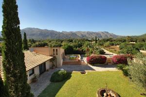 a view of a house with a garden at Cal Xino in Pollença