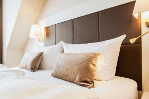 Postel nebo postele na pokoji v ubytování Hotel Birke, Ringhotel Kiel