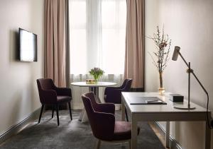 En tv och/eller ett underhållningssystem på Grand Hôtel Stockholm
