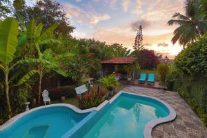 a swimming pool in the backyard of a house at Pousada do Amparo in Olinda