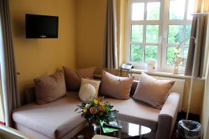 พื้นที่นั่งเล่นของ digitales Event & Hochzeitshotel Zum grünen Baum