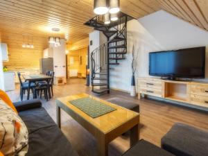 Telewizja i/lub zestaw kina domowego w obiekcie Apartamenty 58 Czarny Groń
