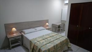 Postel nebo postele na pokoji v ubytování Hotel Premium Flat Ourinhos