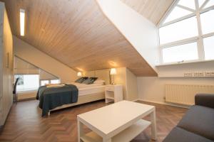 Säng eller sängar i ett rum på Thorsplan Luxury Apartment
