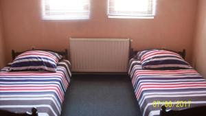 Letto o letti in una camera di Pansion Stari Konak
