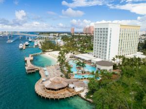 an aerial view of a resort with a marina at Warwick Paradise Island Bahamas - All Inclusive - Adults Only in Nassau