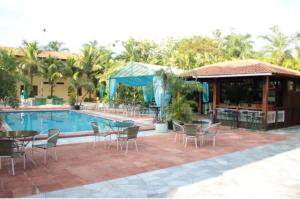 Der Swimmingpool an oder in der Nähe von Mariá Plaza Hotel