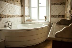 Ванная комната в La Pause Angevine
