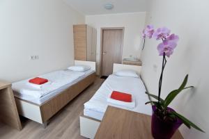 Postel nebo postele na pokoji v ubytování Bella Jūrmala Hotel