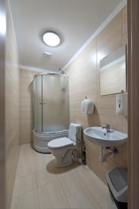 Koupelna v ubytování Bella Jūrmala Hotel + 37 fotografií