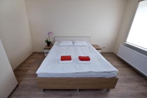 Postel nebo postele na pokoji v ubytování Bella Jūrmala Hotel