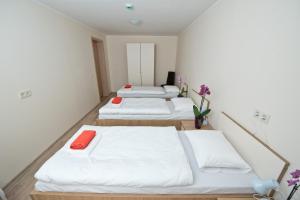 Postel nebo postele na pokoji v ubytování Bella Jūrmala Hotel