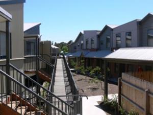 a stairway leading down to a row of houses at Sovereign Views Apartments in Ballarat