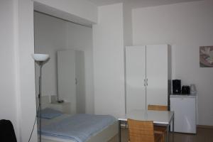 Postel nebo postele na pokoji v ubytování Swiss Star Oerlikon Station - Self Check-In